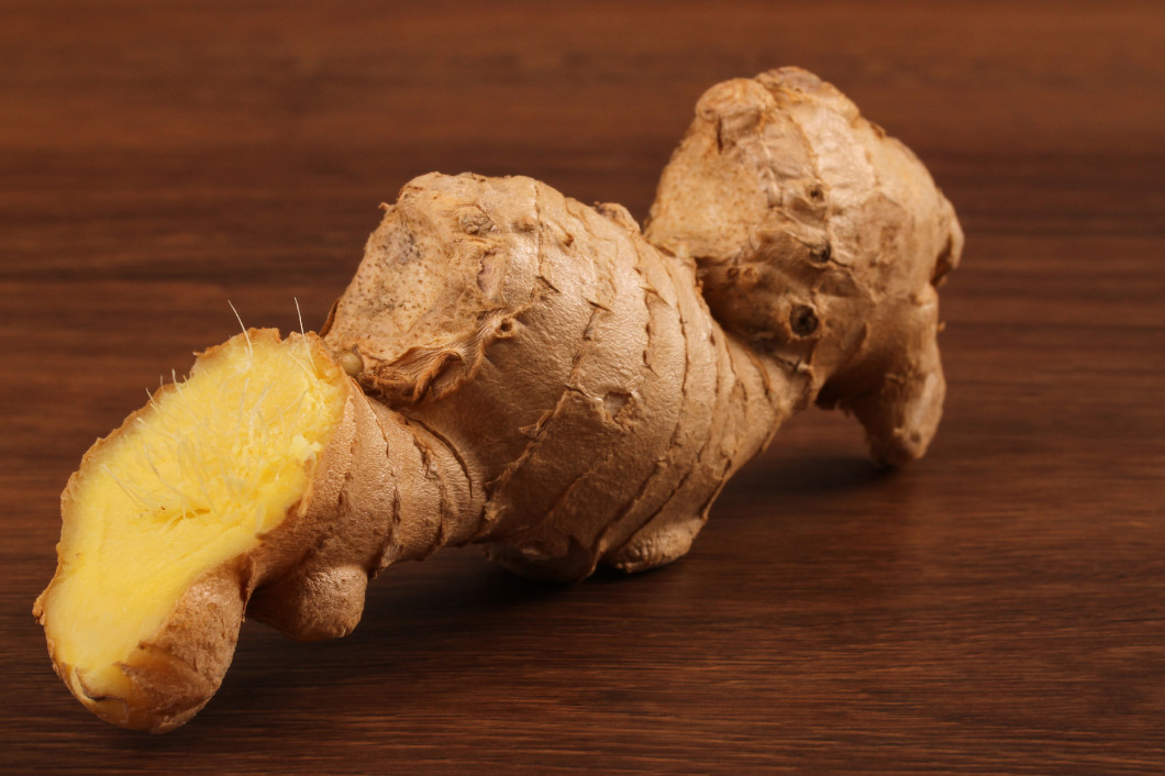 The Ginger root on the wood 