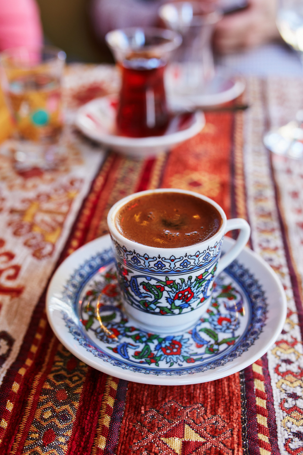 Turkish coffee served served in colorful decorated cup in cafe or restaurant in Istanbul, Turkey