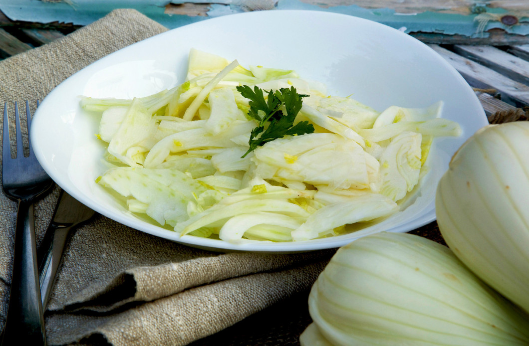 Fresh fennel salad with lemon juice, olive oil and parsley