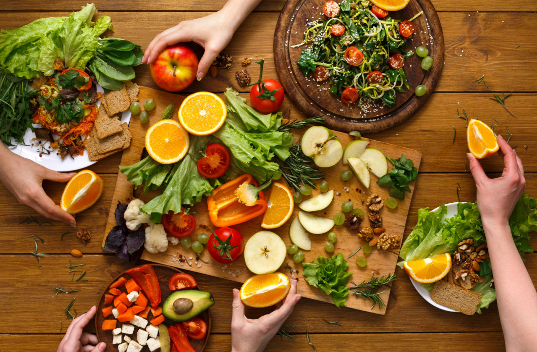 Dinner table, women eat healthy food at home kitchen