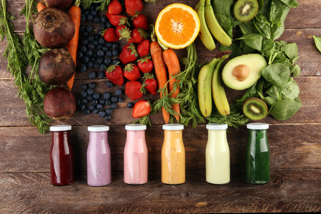 Multicolored smoothies and juices from vegetables, greens, fruit