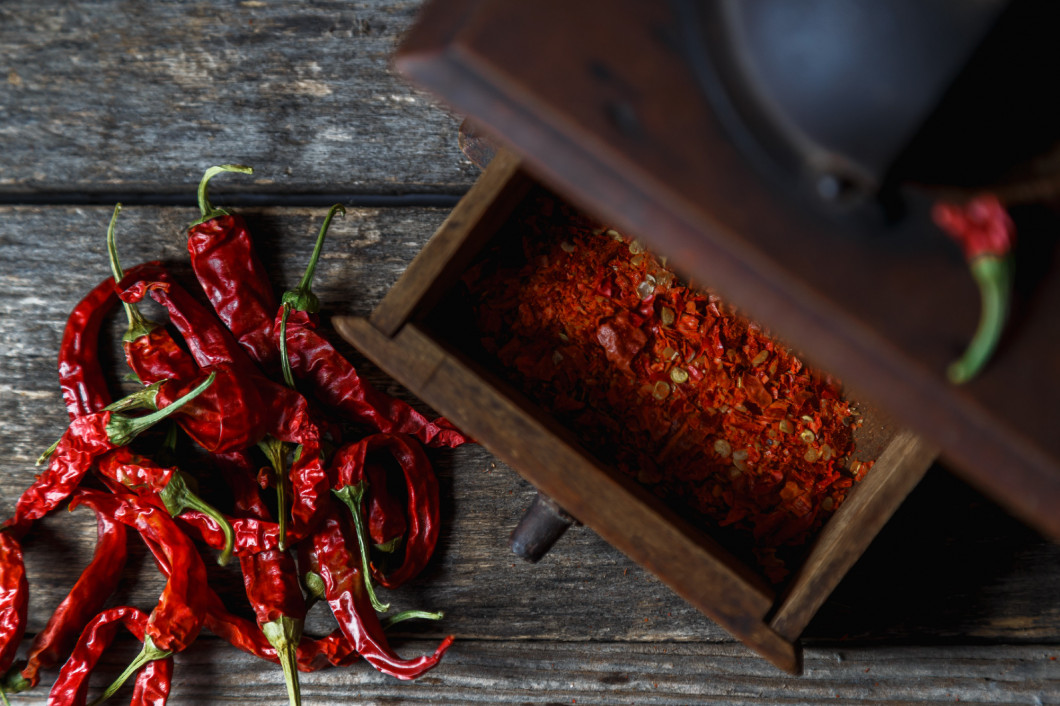 Dry chili peppers, coarsely ground.