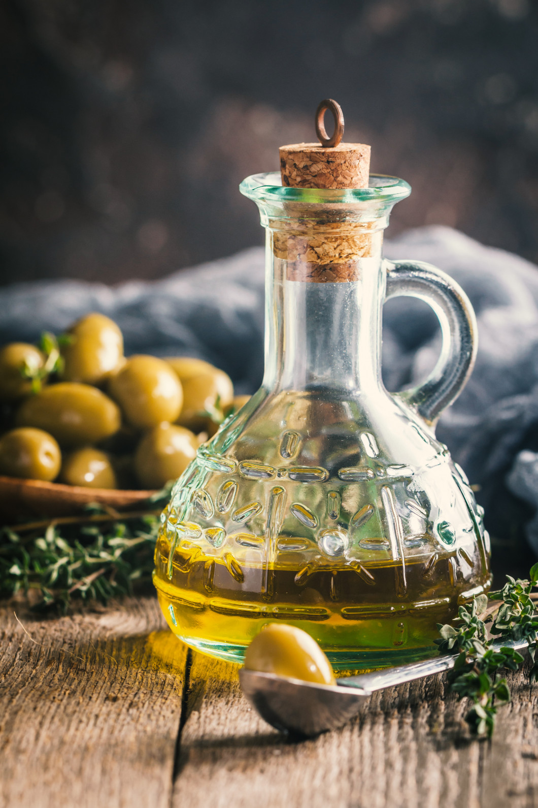 Olive oil and bowl of olives