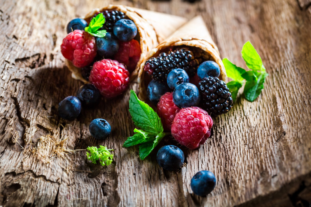 Homemade berry fruits ice cream in waffels as concept