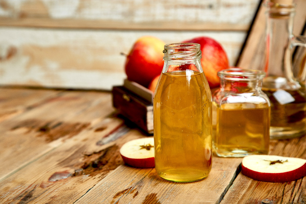 Apple cider vinegar. Bottle of apple organic vinegar