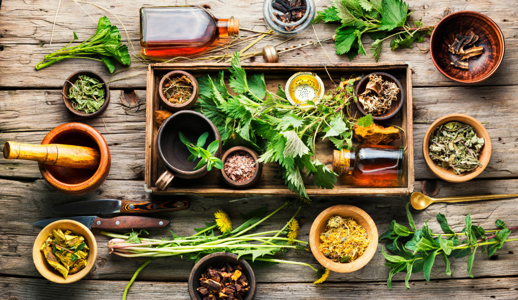 Medicinal plant and extracts,wooden background