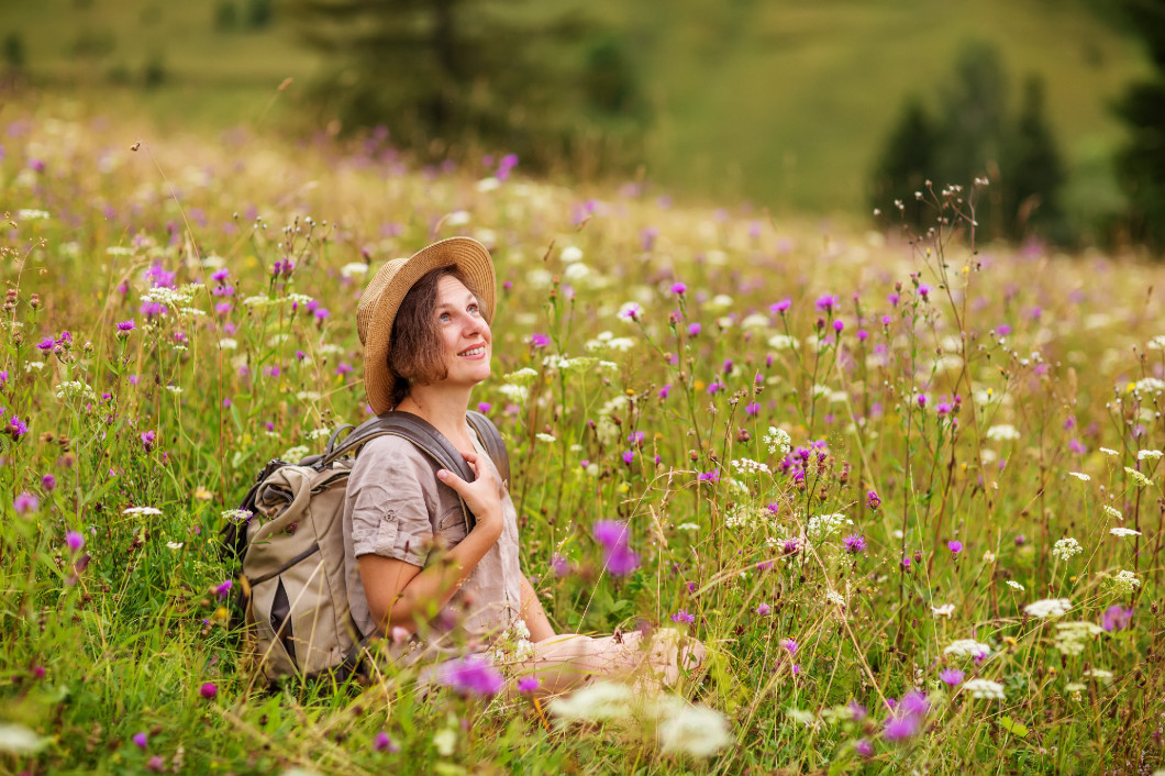 woman hiker enjoy the view at mountain