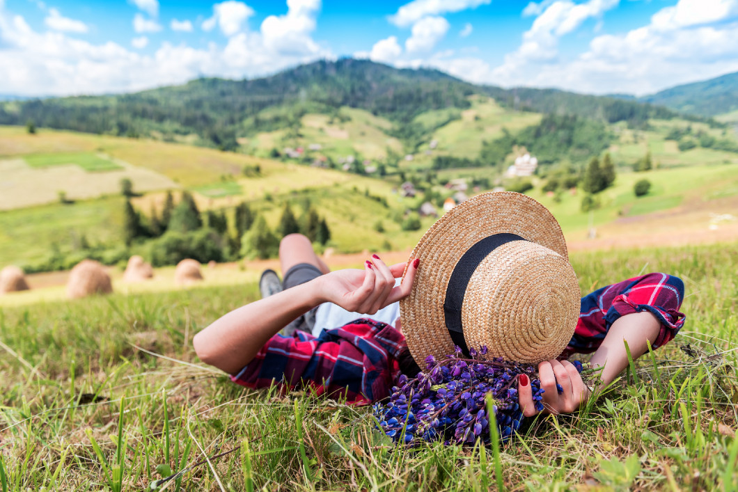 resting girl in straw hat